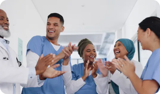 Healthcare workers happily applauding