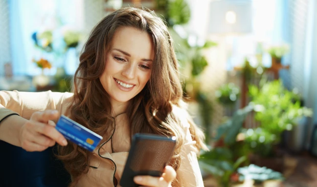 woman using a mobile electronic checkout