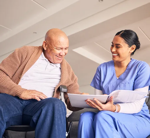 two people reviewing a document together
