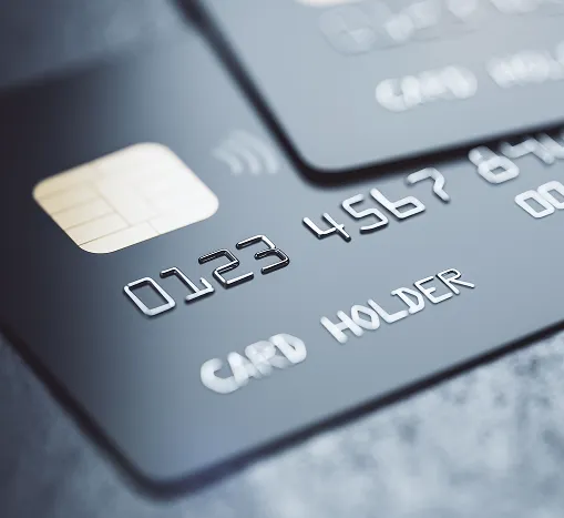 Two credit cards staggered on top of each other